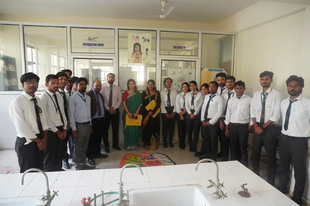 Students participating in Rangoli Making Competition at Siddhartha Institute of Pharmacy
