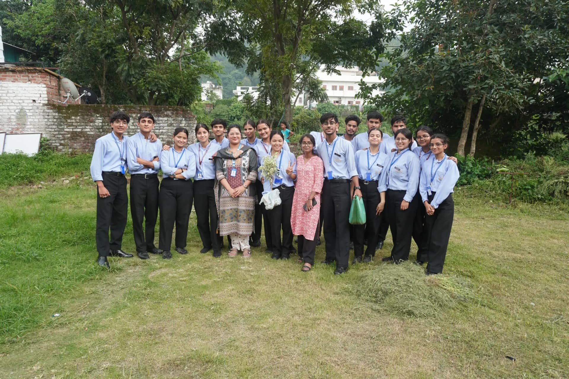 Tree plantation activity during Harela at Siddhartha Nursing Education & Research Institute, Dehradun with active participation of students and faculty members.