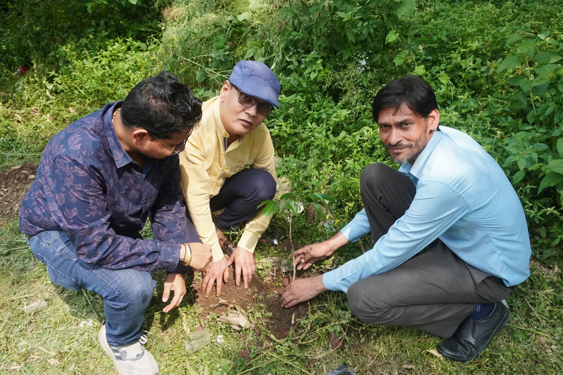 Students and faculty members of Siddhartha Nursing Education & Research Institute, Dehradun participating in a Harela plantation drive for environmental conservation.