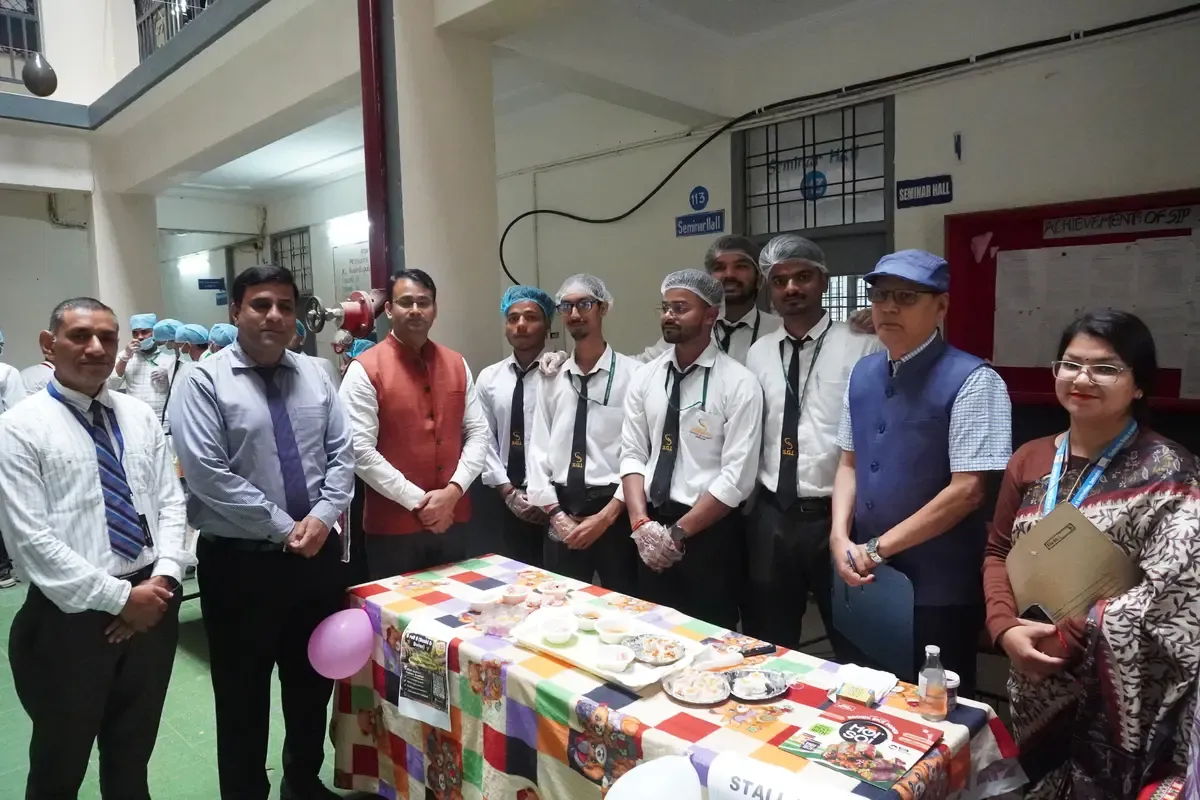 Students participating in No-Fire Food Competition at Siddhartha Institute of Pharmacy